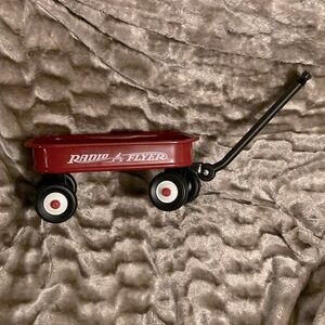 Red Mini Radio Flyer Toy Wagon personalized with the name Avery hand painted on